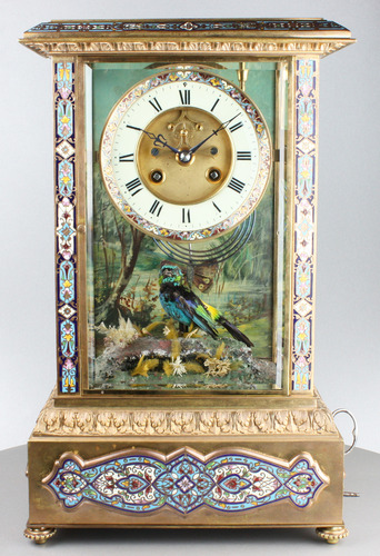 Rare antique gilt metal and champleve enamel timepiece-actuated singing bird, by Bontems