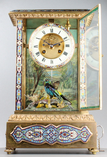 Rare antique gilt metal and champleve enamel timepiece-actuated singing bird, by Bontems