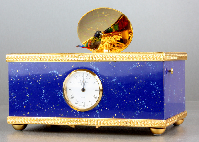 Lapis-lazuli enamelled and gilt musical timepiece alarm-actuated singing bird box, by Reuge