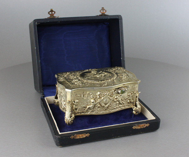 Vintage silver-gilt bow-front form singing bird box, by Karl Griesbaum