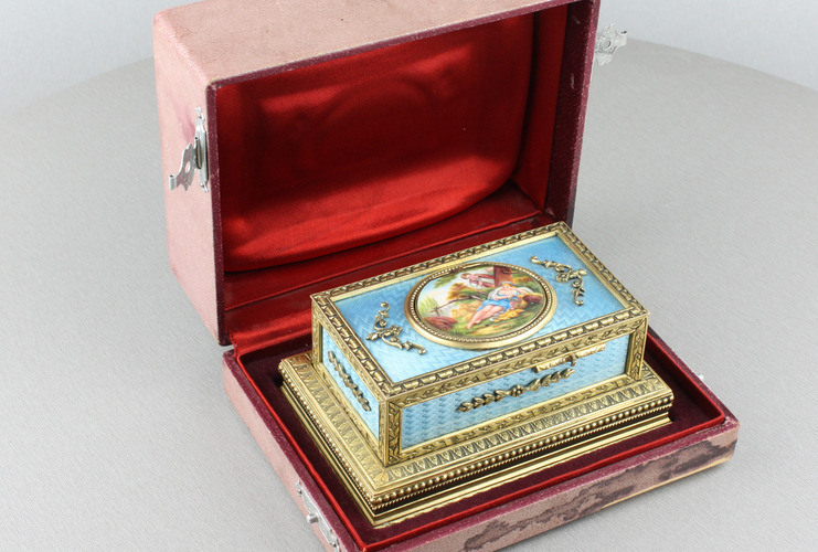 Powder blue guilloche and pictorial enamel singing bird box casket, by C. H. Marguerat