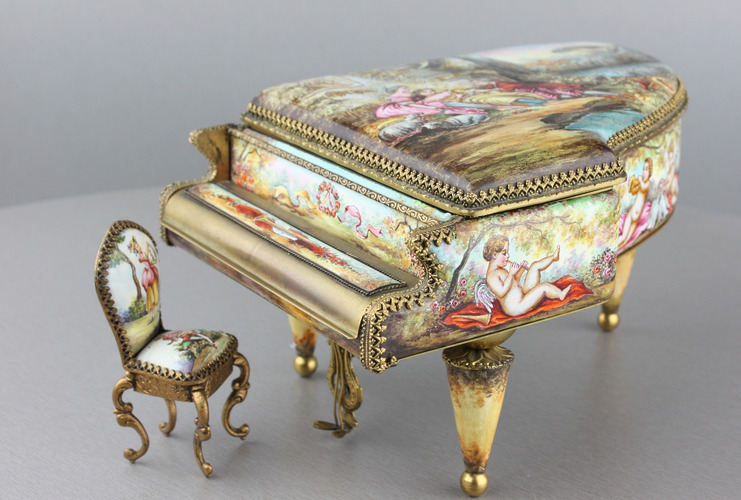 A large vintage Viennese enamel and gilt metal musical grand piano with chair