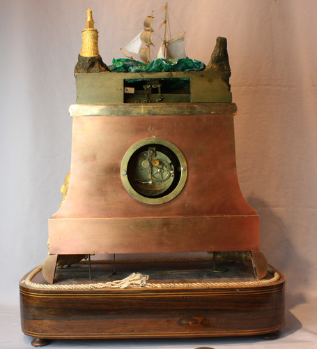 Monumental Antique bronze, ormolu and polished copper on bronze rocking ship automaton clock